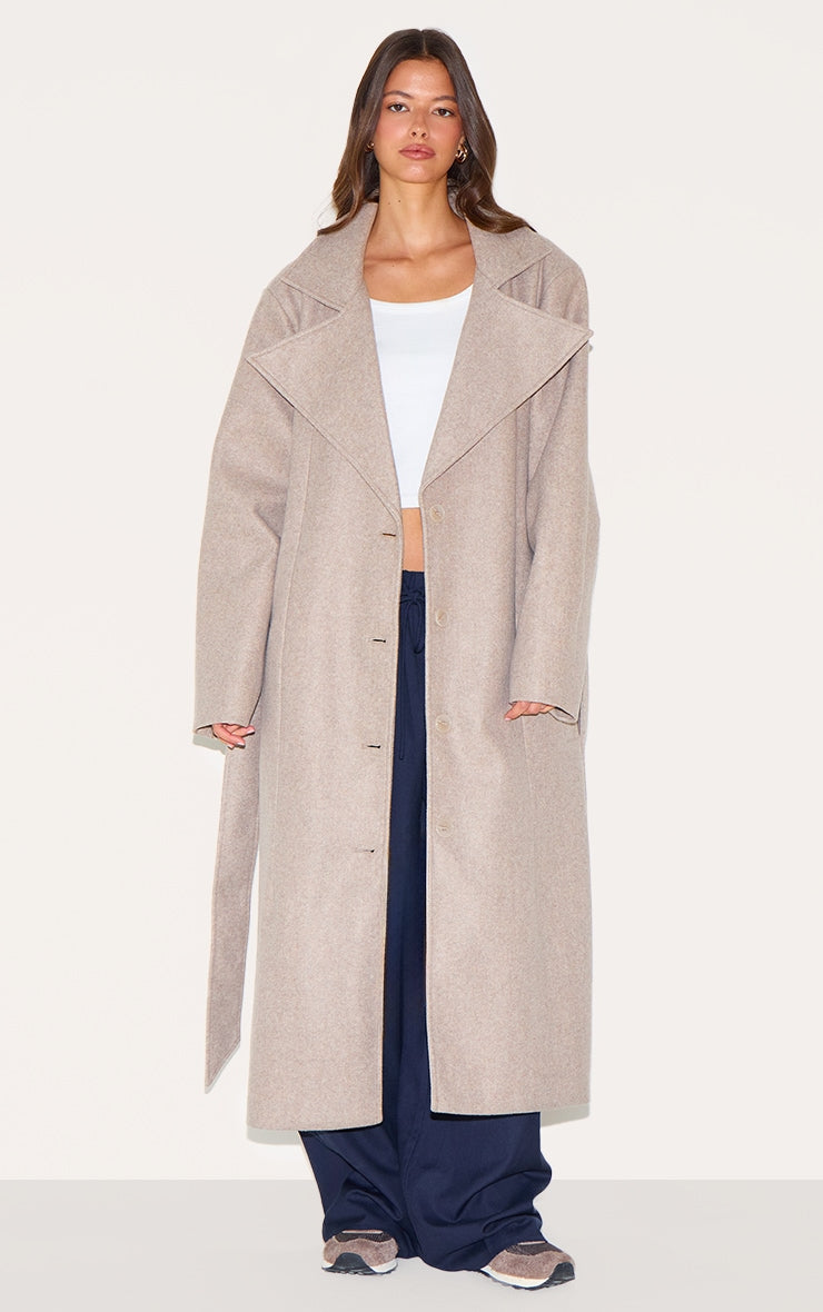 https://cdn-img.prettylittlething.com/1/2/e/e/12ee09182aa1cbba2e19552abf65d710174fe83b_CNL5185_1_taupe_oversized_wool_look_trench_coat.jpg