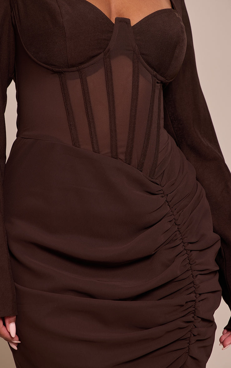 https://cdn-img.prettylittlething.com/7/c/5/5/7c5539344101915fce81b9143f60a84eb28a8bdb_CNO0520_4_shape_chocolate_mesh_insert_corseted_ruched_side_mini_dress.jpg