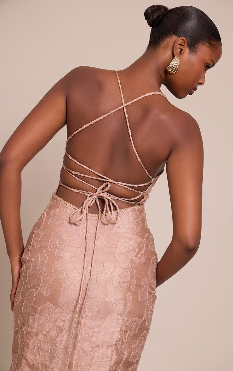 https://cdn-img.prettylittlething.com/9/1/b/0/91b0bbc46ea81daaabdd17f5fec1550e60bd2490_CNO3771_4_taupe_textured_lace_up_back_maxi_dress.jpg