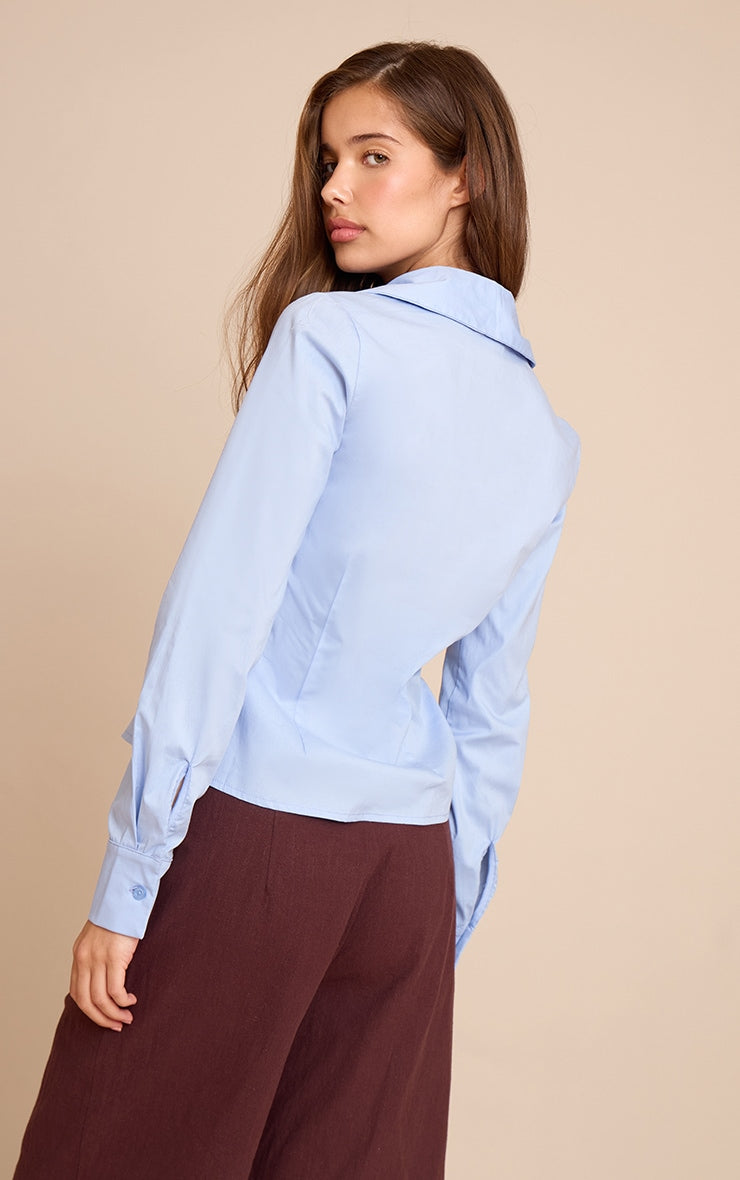 https://cdn-img.prettylittlething.com/b/f/9/1/bf91a19dec31adc483815bc951c2df5ecca299e0_CNN0893_2_sky_blue_fitted_long_sleeve_shirt.jpg